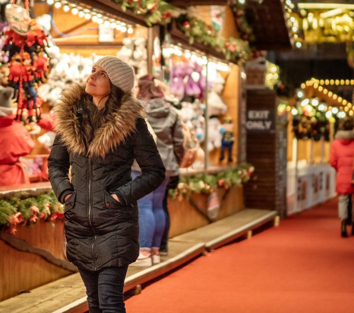A woman enjoys a Christmas Market