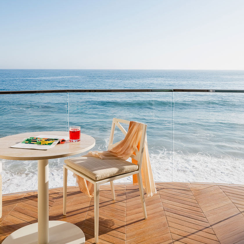 Couple relaxing on balcony