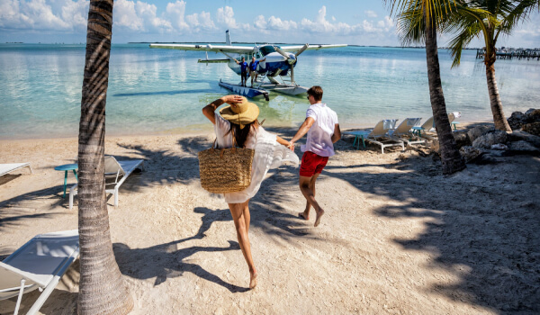 Young couple enjoys the beach at Key Largo in the Florida Keys