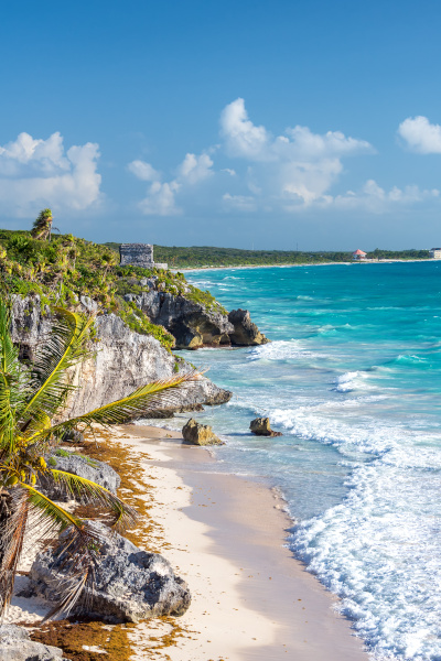White sand beach with cliffs overlooking the Pacific in Mexico