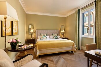 Two-Bedroom Family Suite Garden View, at Hotel de Russie