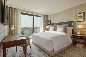 Deluxe Balcony Garden Suite, at Jumeirah Carlton Tower