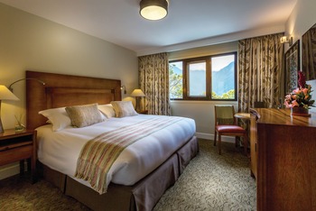 Deluxe Room, at Belmond Sanctuary Lodge