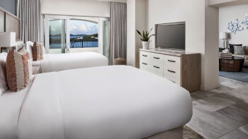 Club Ocean Front Suite, Club level, 1 Bedroom Suite, 2 Queen, Sofa bed, at The Ritz-Carlton, St. Thomas