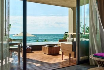 Premier Beachfront Suite, at Rosewood Mandarina