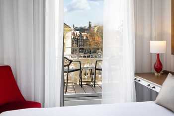 Superior Room with City View and Balcony, at Tivoli Doelen Amsterdam