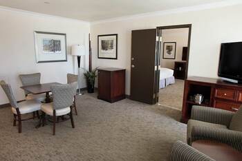Junior King Suite- 2 Room 2 Bath- Nonsmoking, at President Abraham Lincoln Springfield - a DoubleTree by Hilton Hotel
