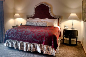 One Bedroom Suite with Garden View and Balcony - One King Bed, at Mirbeau Inn & Spa at The Pinehills