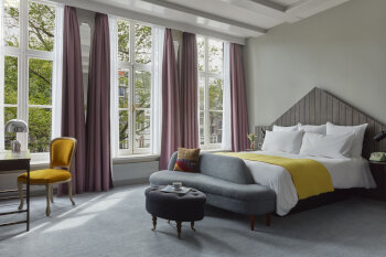 Generous King Canal View Room, at Pulitzer Amsterdam