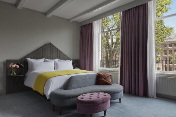 Generous Queen Canal View Room, at Pulitzer Amsterdam