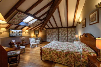 Attic Suite, King Bed, at Hotel Posta