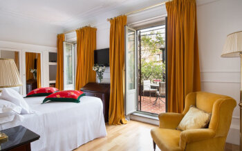 Deluxe Room with Terrace and City View, at Grand Hotel Plaza