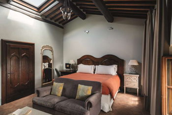 Deluxe Junior Suite, at Castello di Casole, A Belmond Hotel, Tuscany