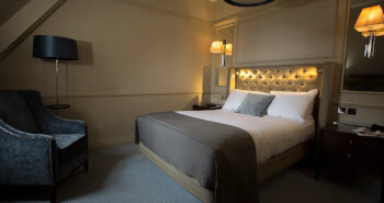 Queen Junior Suite with Castle View, at The Caledonian Edinburgh, Curio Collection by Hilton