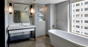1 King Corner Mobility/Hearing Access Bathtub, at Hotel 1000 Seattle