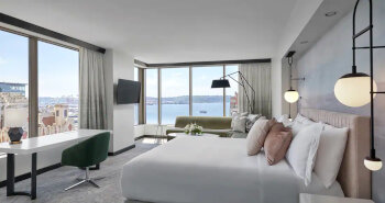 Grand Corner Water View King Junior Suite, at Hotel 1000 Seattle