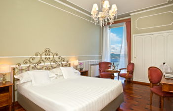 Deluxe Double Room Queen Bed (one bed only) Sea View with Balcony, at Grand Hotel Miramare
