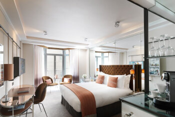 Deluxe Bay Window Room, at The Athenaeum Hotel & Residences