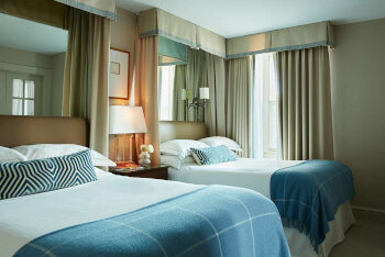 Two Bedroom Suite with One Queen Bed and Two Double Beds, at The Eliot Hotel